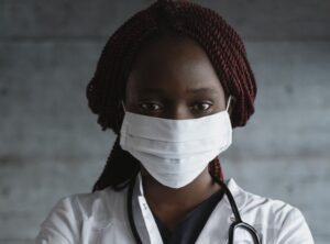 Female doctor in mask Burnout in women physicians