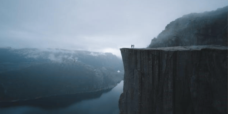A lone cliff edge symbolizing doctors on the brink of burnout